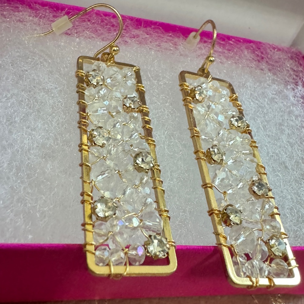 Gold dangle statement earrings